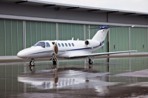 9296818-private-jet-front-of-hangar